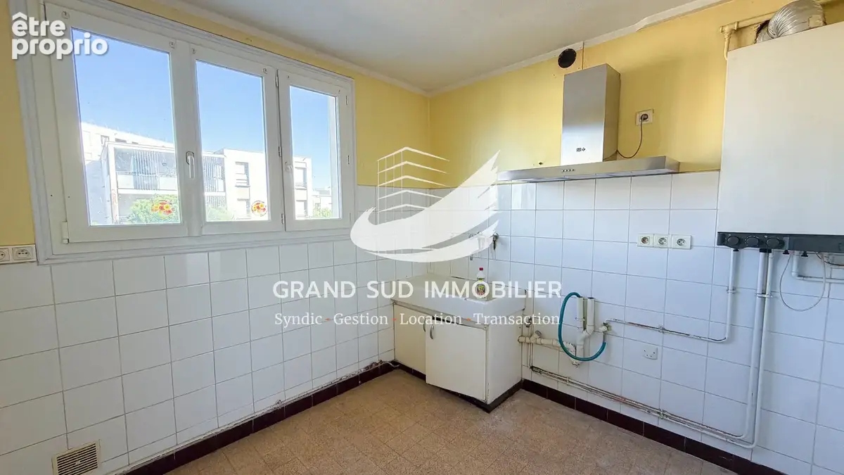 Appartement t4 traversant avec garage proche des commodités - photo 4