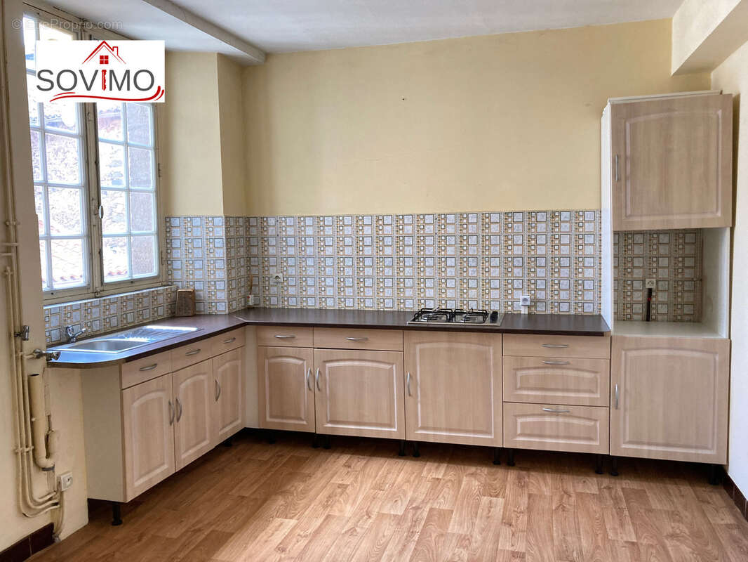 Immeuble a investissement locatif : 2 appts + 1 local commercial - photo 2