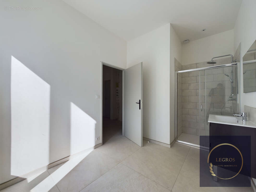 Appartement de type 2 en rez de chaussé - photo 5