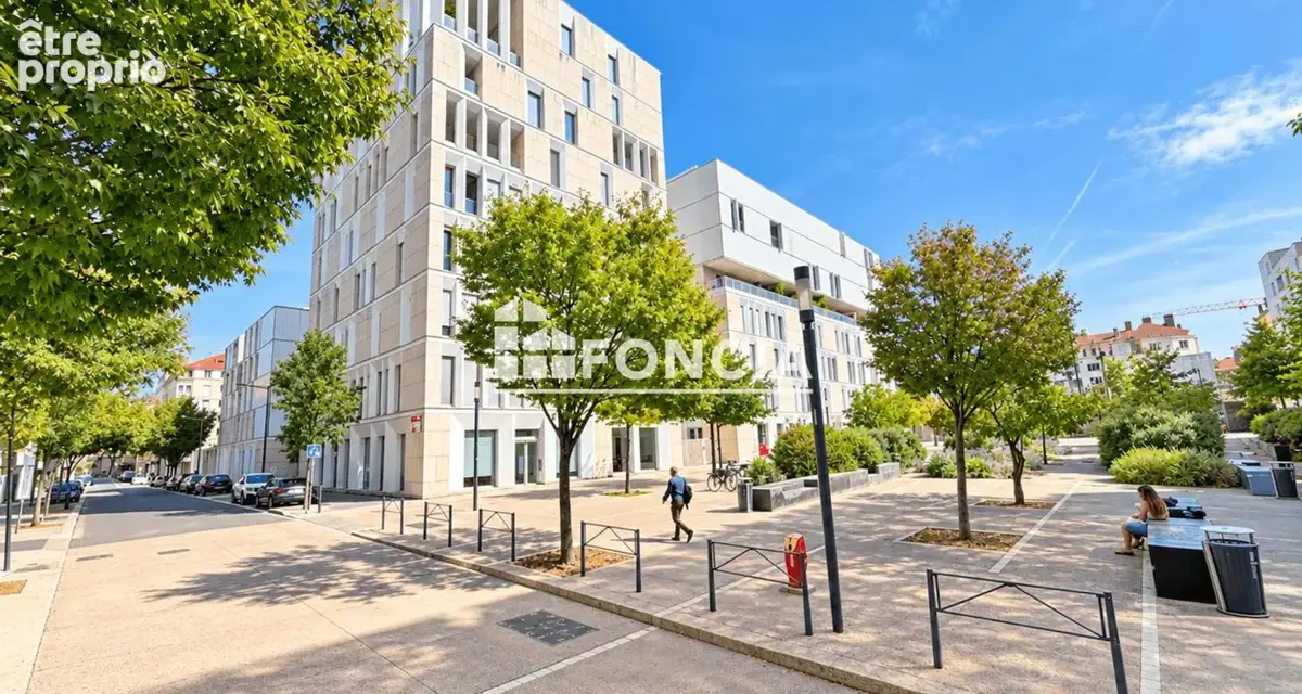 Lyon 2e – confluence  duplex en étages élevés avec loggia, garage et parking - photo 2