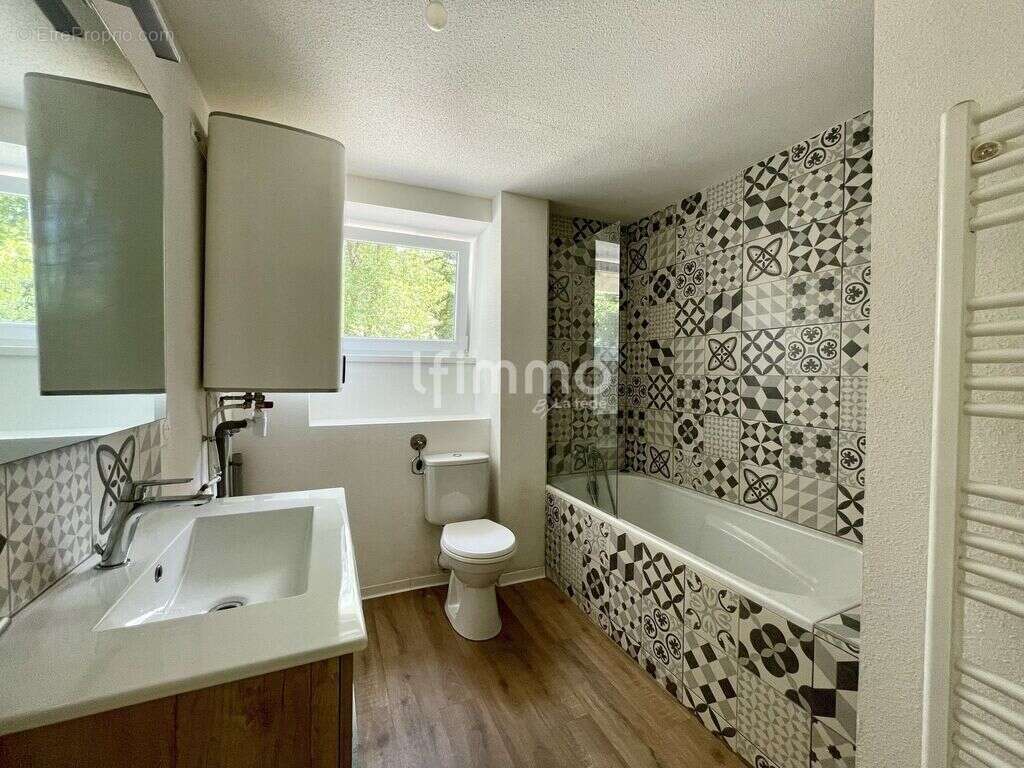 Appartement 3/4 pièces avec terrasse et parking - photo 3