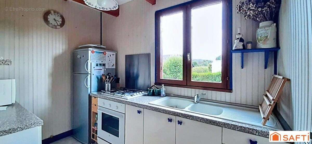 Photo 8 - Maison à LA MADELEINE-BOUVET