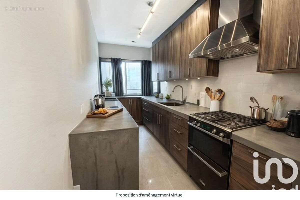 Photo 4 - Appartement à COURBEVOIE