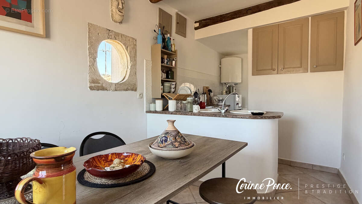 Nimes centre appartement 52 m2 dernier etage terrasse privative propose par corinne ponce immobilier - photo 6