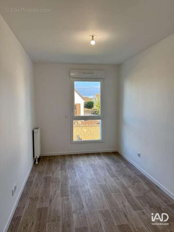 Photo 9 - Appartement à CORMELLES-LE-ROYAL