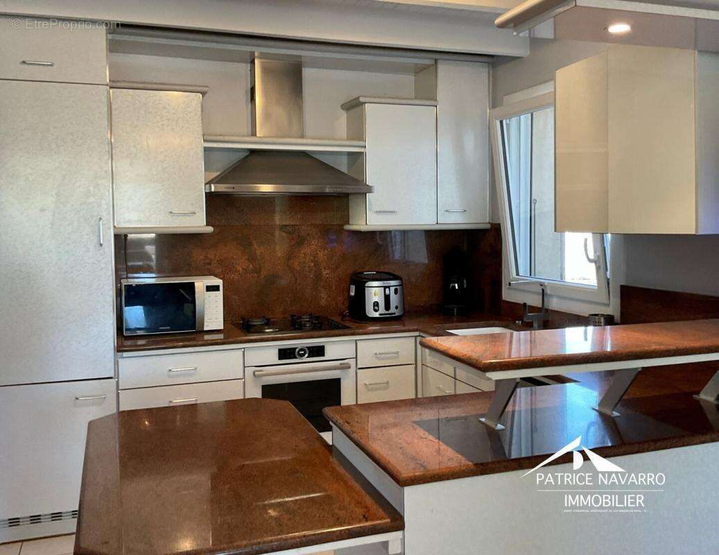 Maison plain-pied 6 pieces 106 m² - photo 4