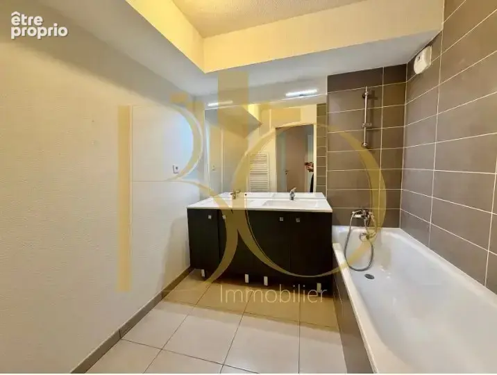 Appartement 3 pièces de 66 m² avec terrasse et double stationnement - photo 14
