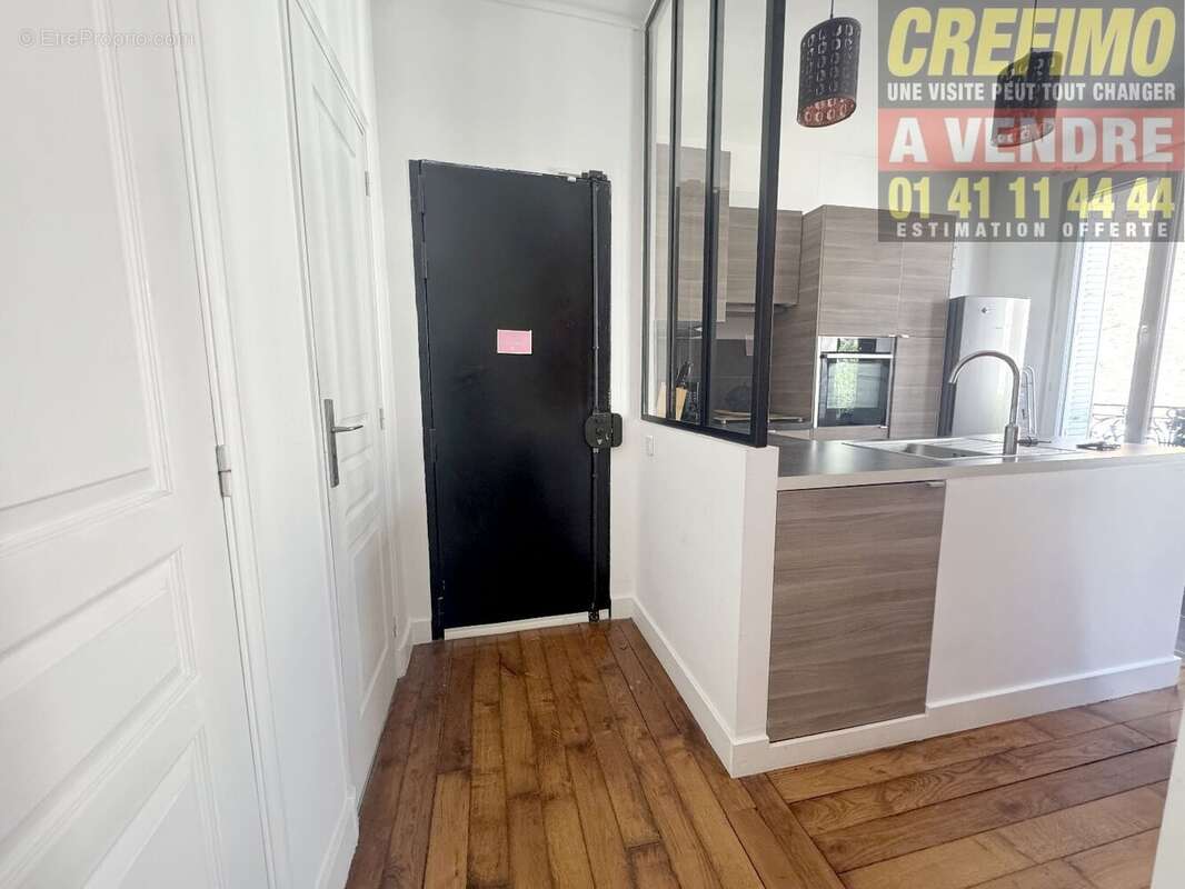 Appartement de caractère avec cachet, belle pièce de vie, cuisine aménagée à Asnières-sur-Seine. - photo 11