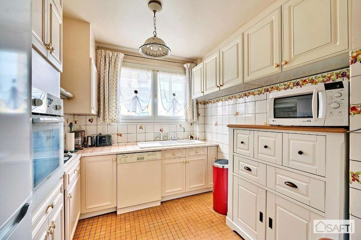 Photo 3 - Appartement à COURBEVOIE