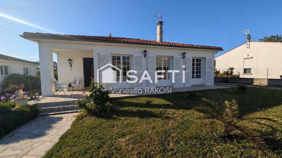 Photo 1 - Maison à SAINTES