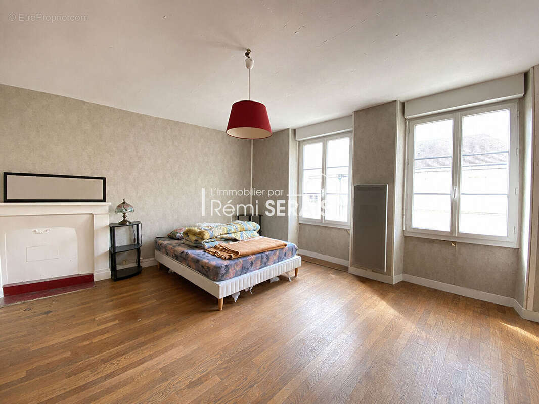 Maison de bourg avec volumes généreux et potentiel d'aménagement - photo 5