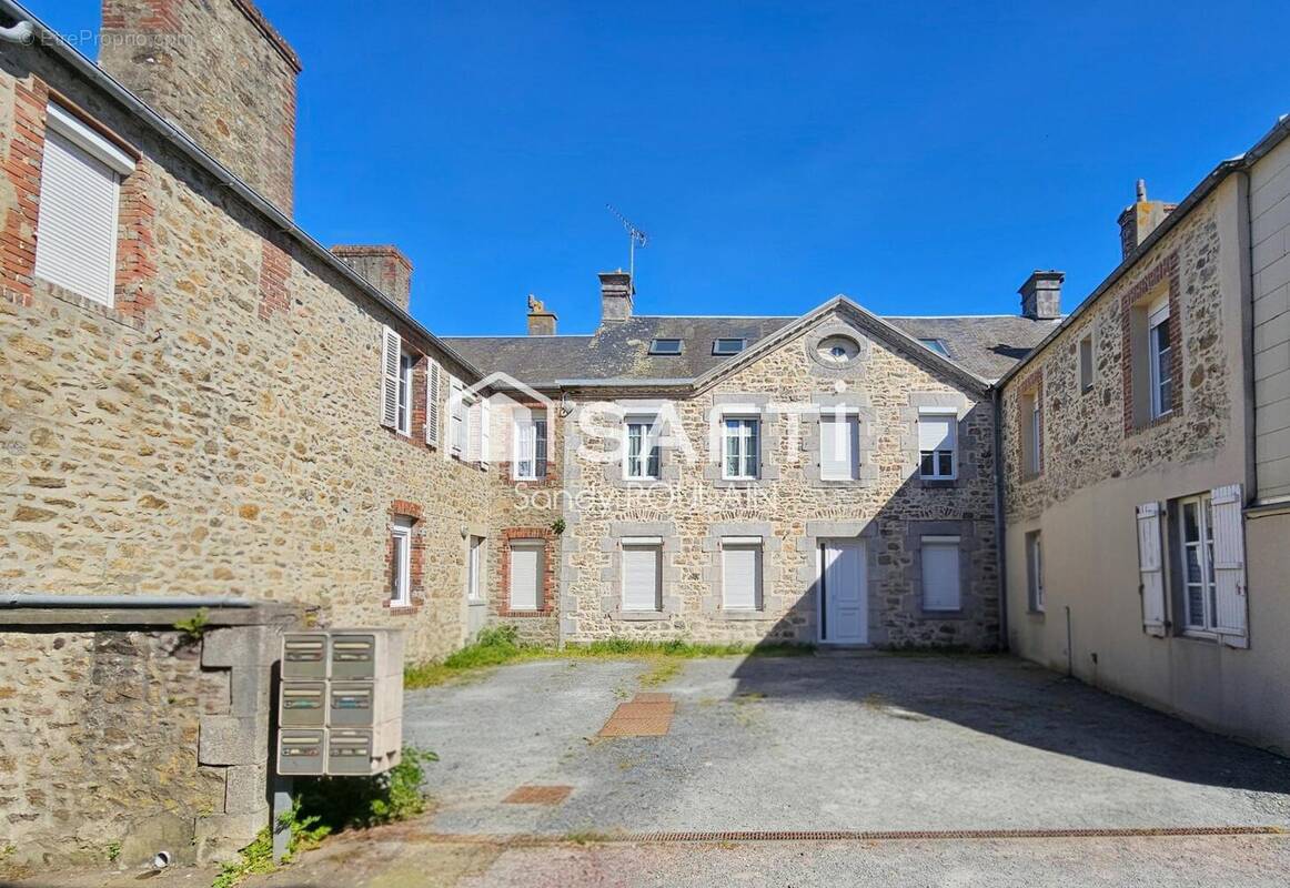 Photo 1 - Appartement à AGON-COUTAINVILLE
