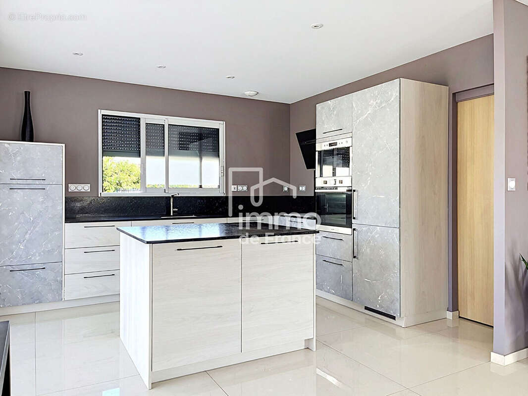 Maison plain pied Peronnas 5 pièce(s) 136 m2 - photo 4