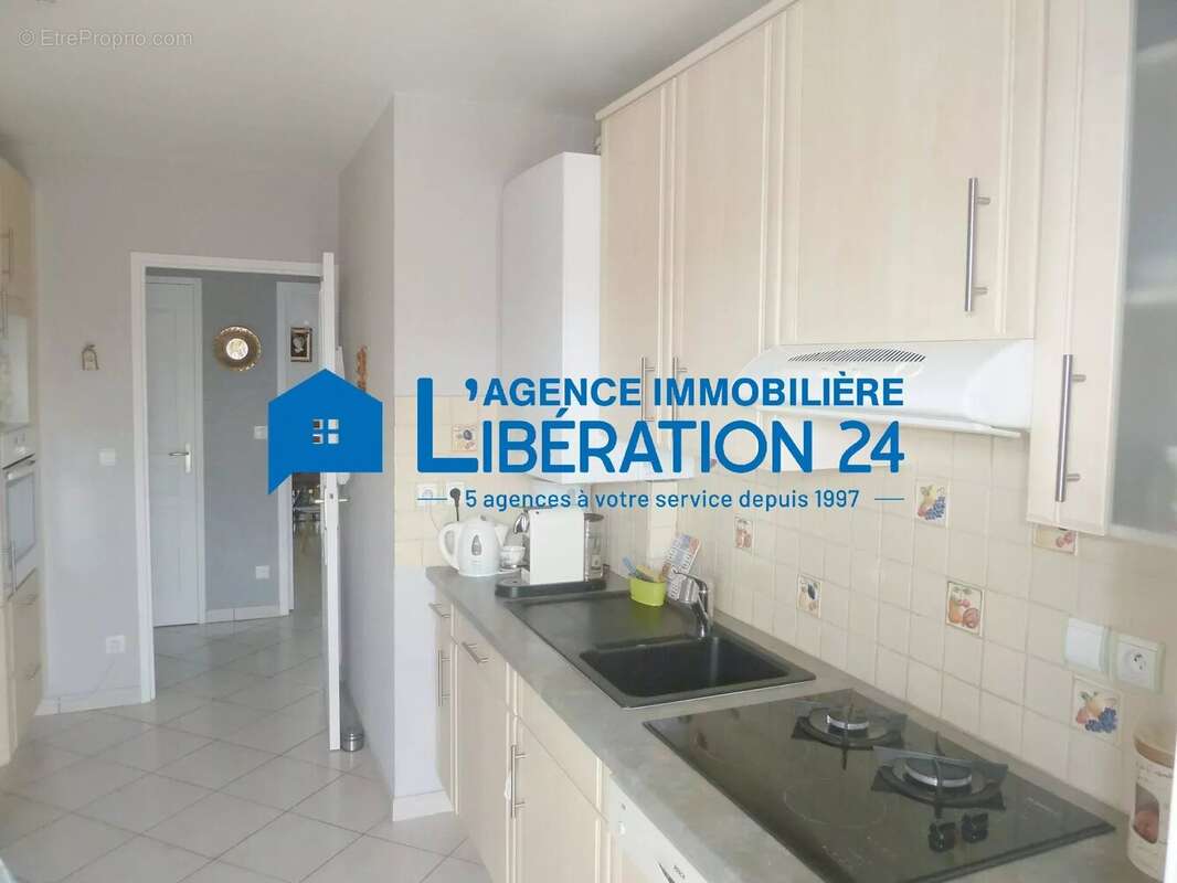 APPARTEMENT T2 56m²  Ascenseur +2terrasses+garage+parking+cave - photo 4