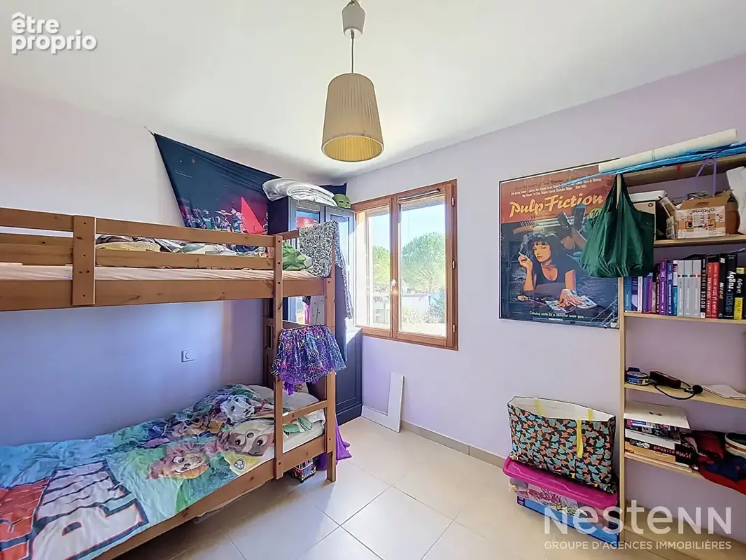 A Vendre Maison contemporaine de plain-pied, double garage, Carport et terrain de 1 731 m². - photo 10