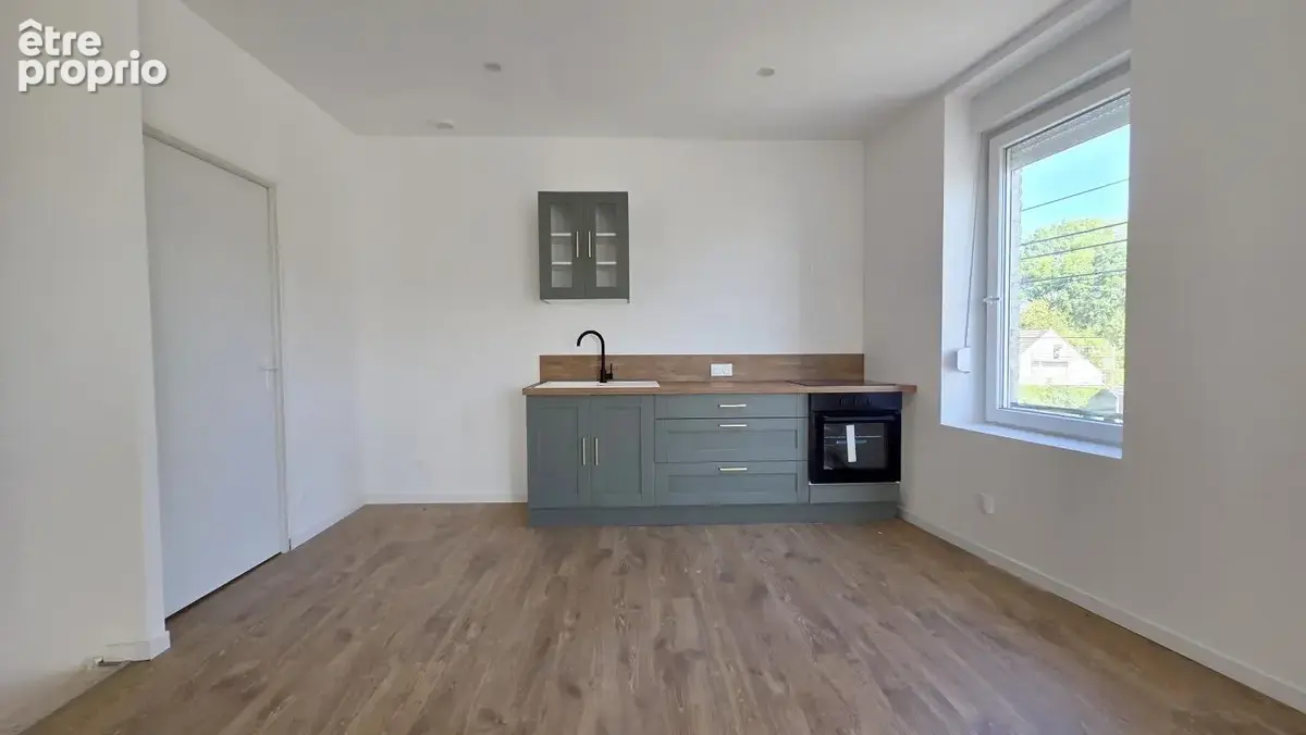 Immeuble comprenant deux logements rénovés situé à Fourmies - photo 8