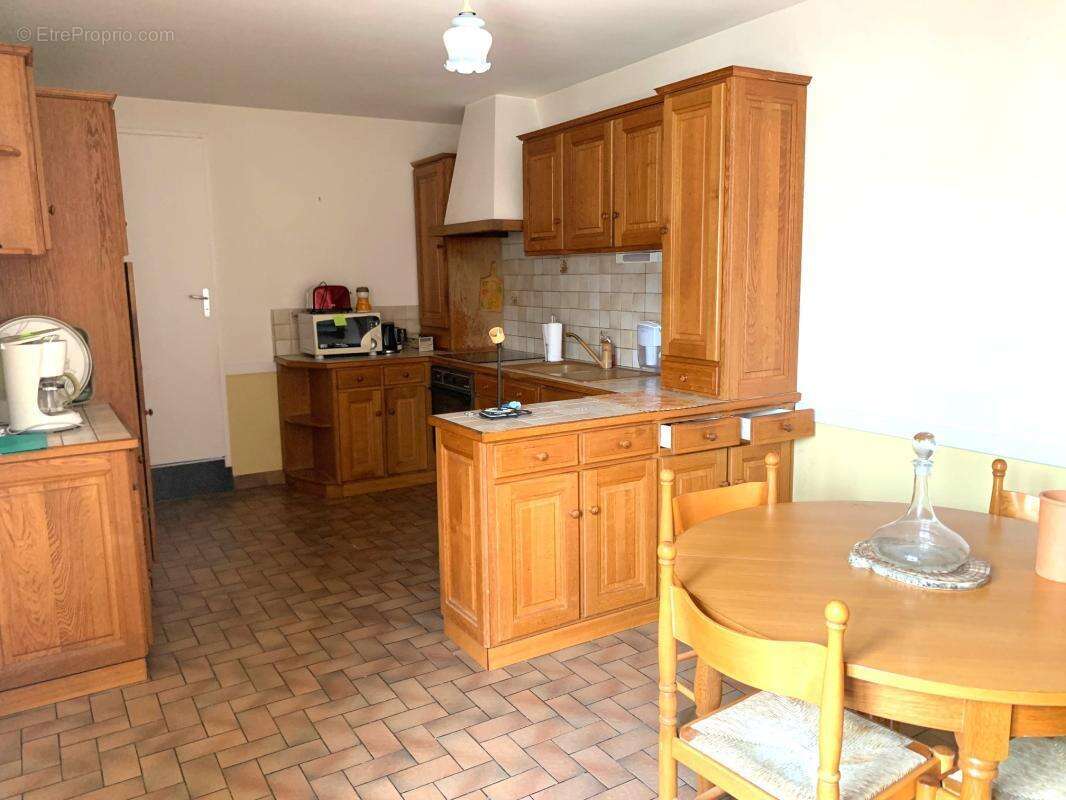 Maison familiale 121 M2 plein bourg - photo 4