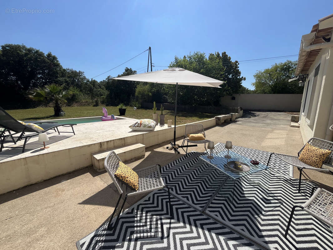 PARIGNARGUES Villa de 135 m2 avec piscine sur terrain de 2700 m2 et hangar de 100 m2 - photo 2