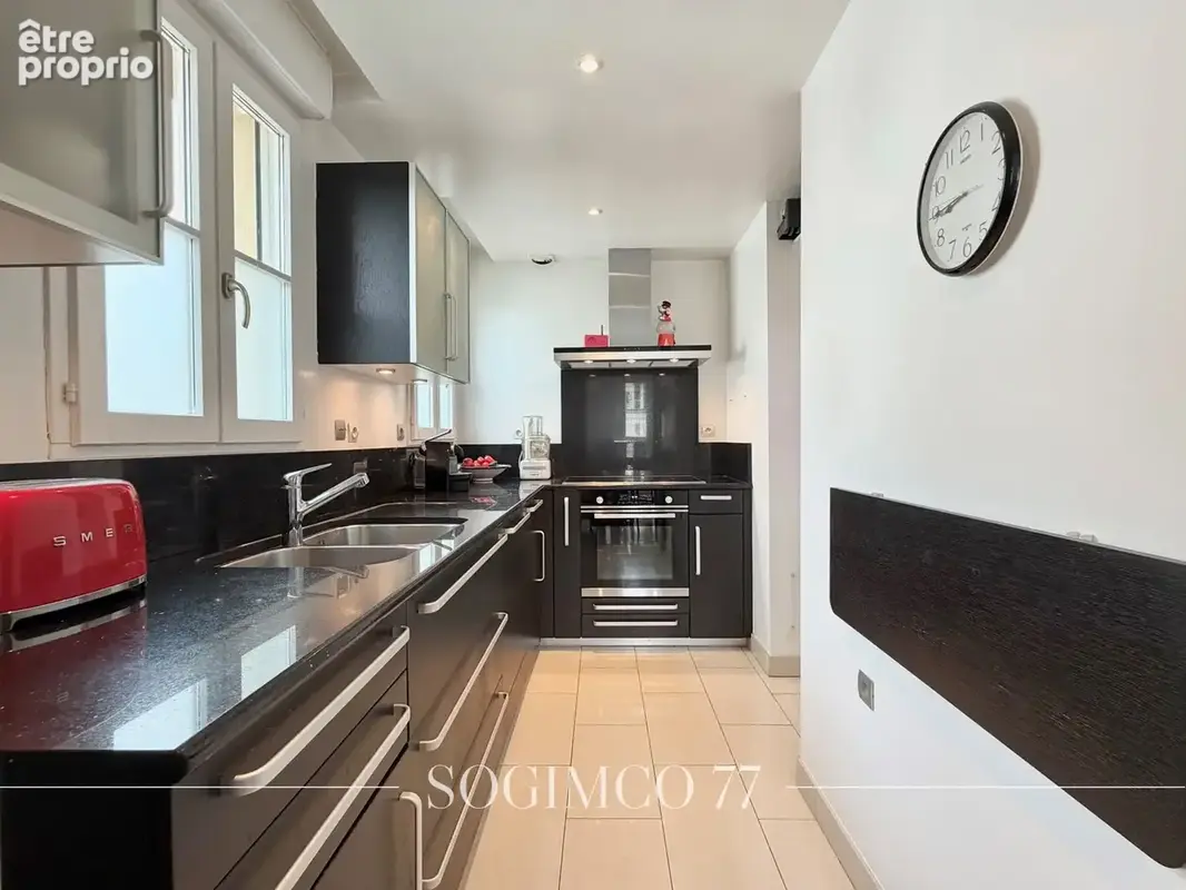Exceptionnel en hyper centre : duplex au dernier étage avec ascenseur et terrasse de 25 m2 - photo 7