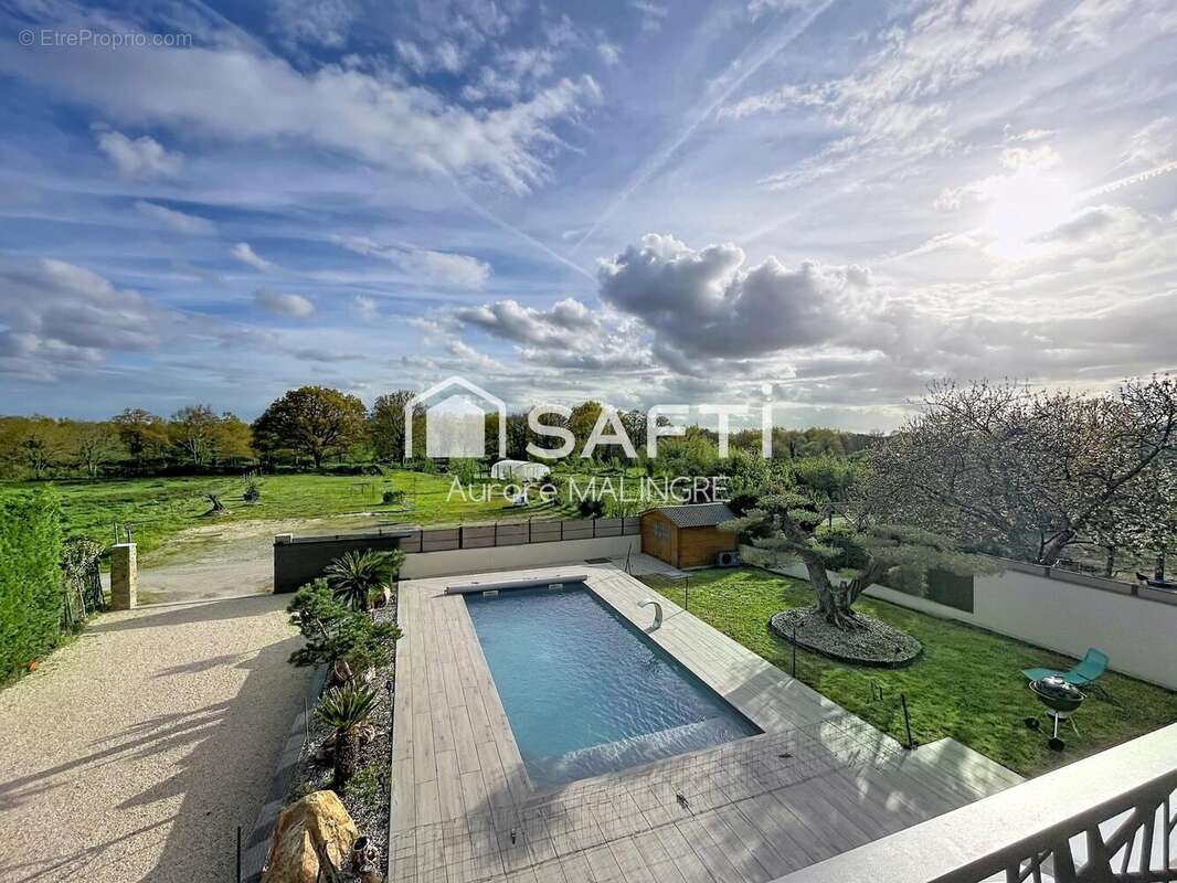 Photo 8 - Maison à TREILLIERES