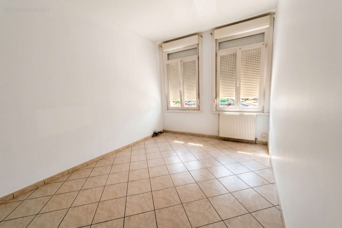 Maison mitoyenne avec jardin 59880 Saint-Saulve - photo 4