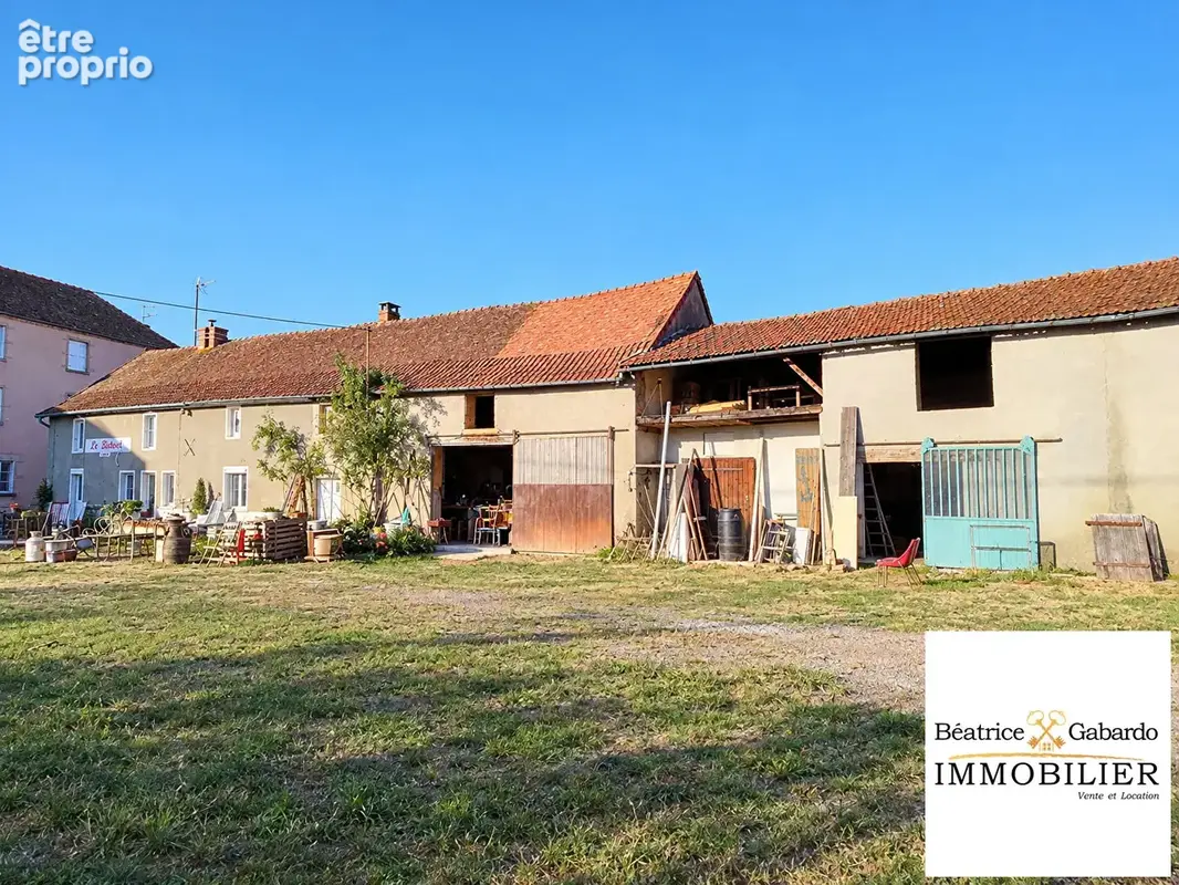 Maison en pierre avec dépendances et fort potentiel - photo 2
