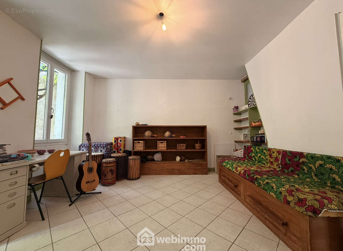 Un salon cosy de 20 m² - Maison à LAON