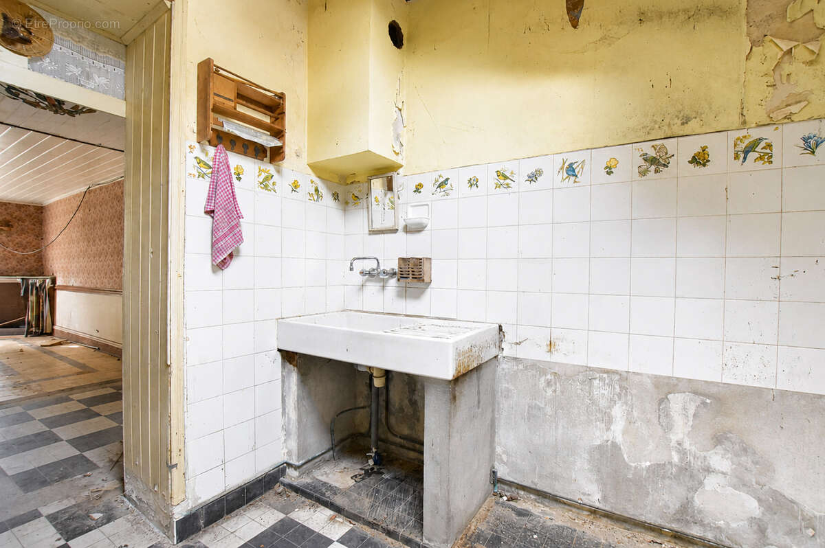 Maison avec cachet en plein centre - photo 5