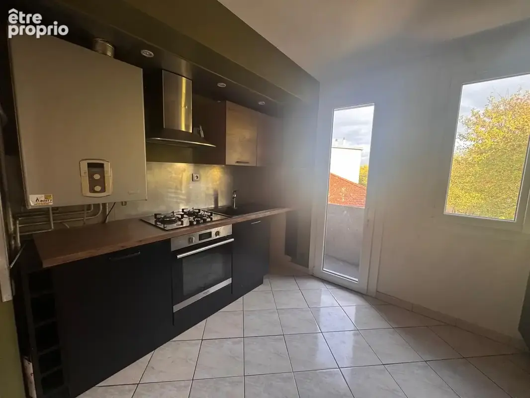 Appartement 4 pièces 97 m² à vendre à Roanne (42300) - photo 4