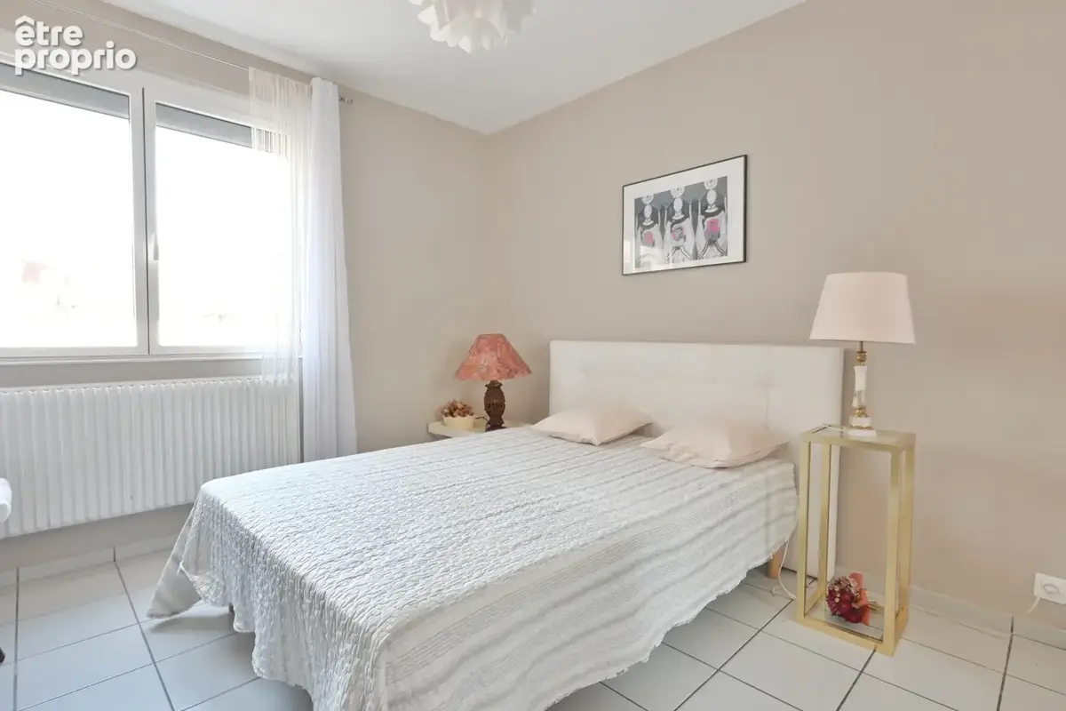 Appartement T3/T4 de 82 m2, balcon, cave et garage fermé   Secteur Beaulieu - photo 8