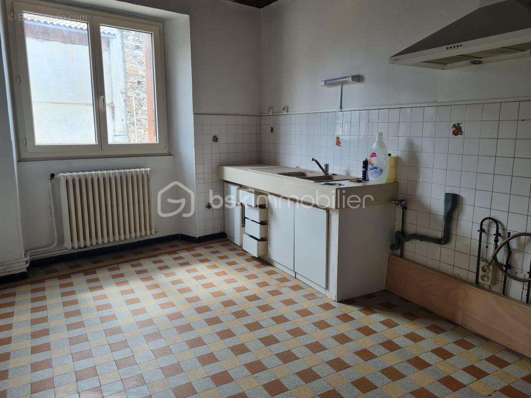 Immeuble au cœur du village - photo 4