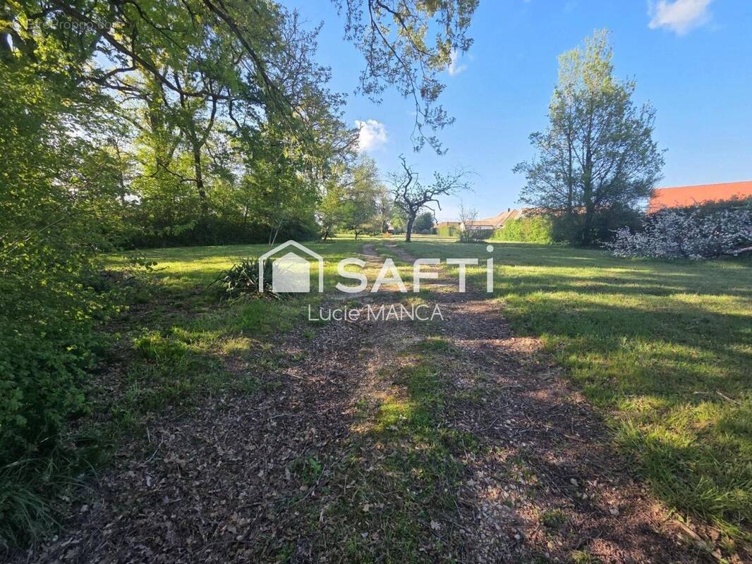 Photo 1 - Terrain à LESSARD-LE-NATIONAL