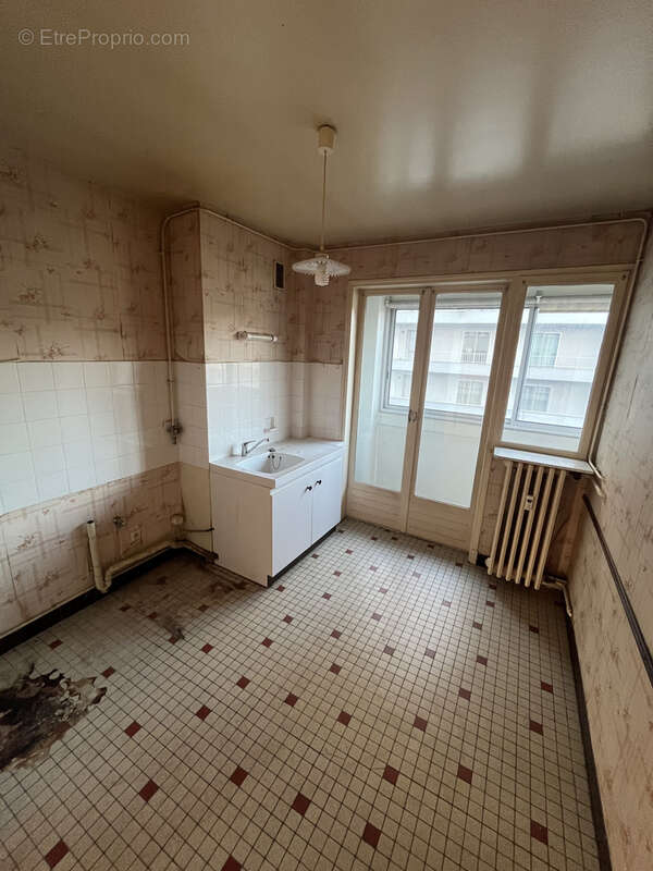 Appartement avec potentiel proche centre ville - photo 4