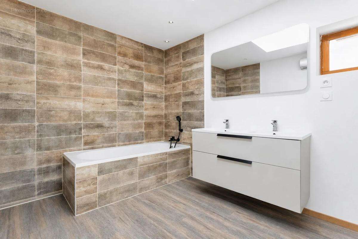 Maison de 4 pièces de 101 m² à Bauvin - photo 4