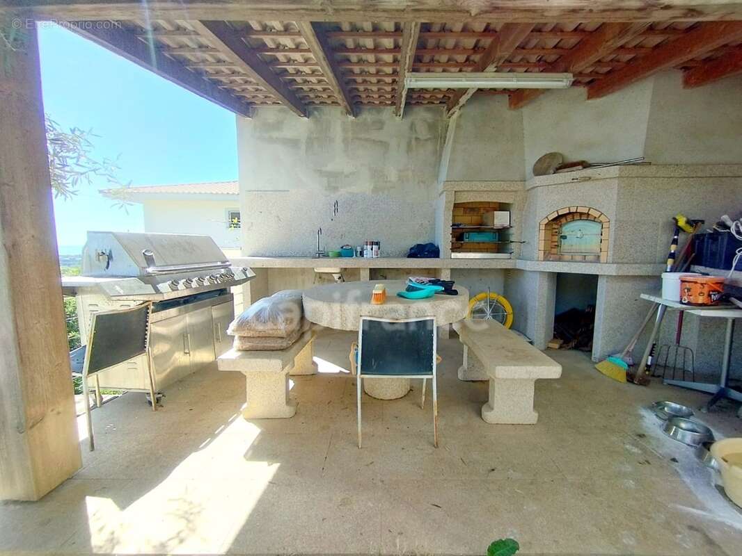 Maison T5 de 124 m2, avec grande terrasse et vue panoramique sur la mer, parking et son jardin à FOLELLI 20213 (HAUTE CORSE) - photo 16