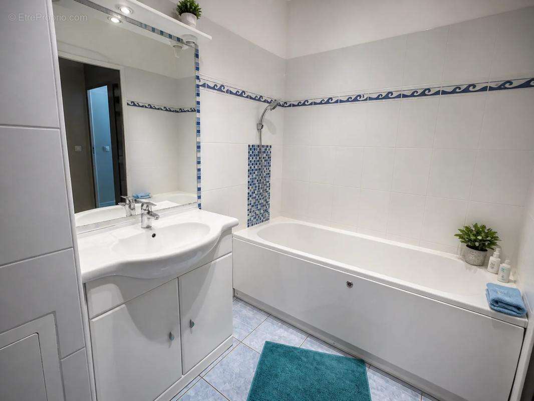 Appartement de 4 pièces de 84 m² à Beaumont-sur-Oise - photo 9