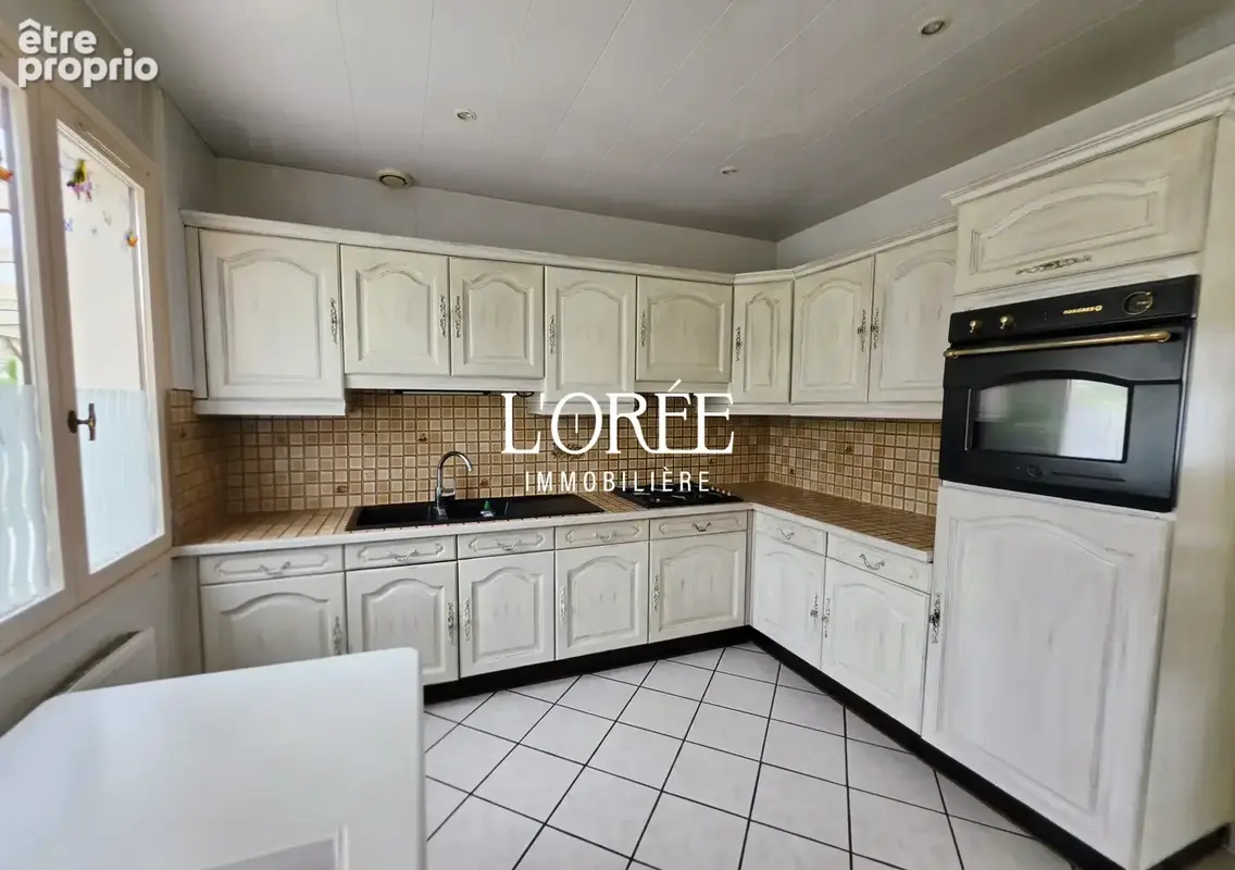 Plain pied individuel -  76m2 - 3 chambres - veranda de 20m2 - jardin - garage - photo 6
