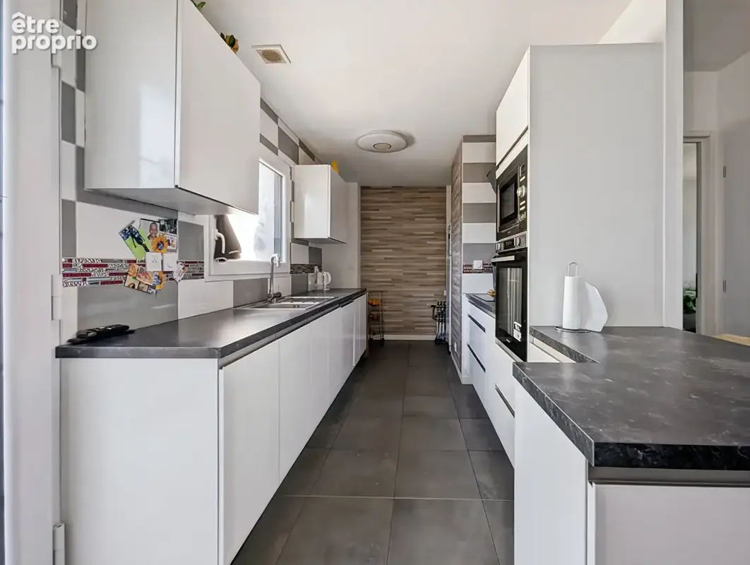 A vendre  SAINT AUBIN D AUBIGNE  maison familiale 4 chambres - photo 4