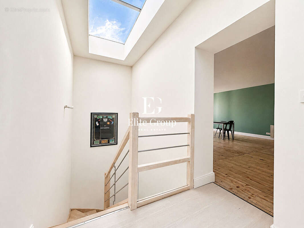 Élégant appartement esprit maison de ville avec terrasse sur les toits - photo 13