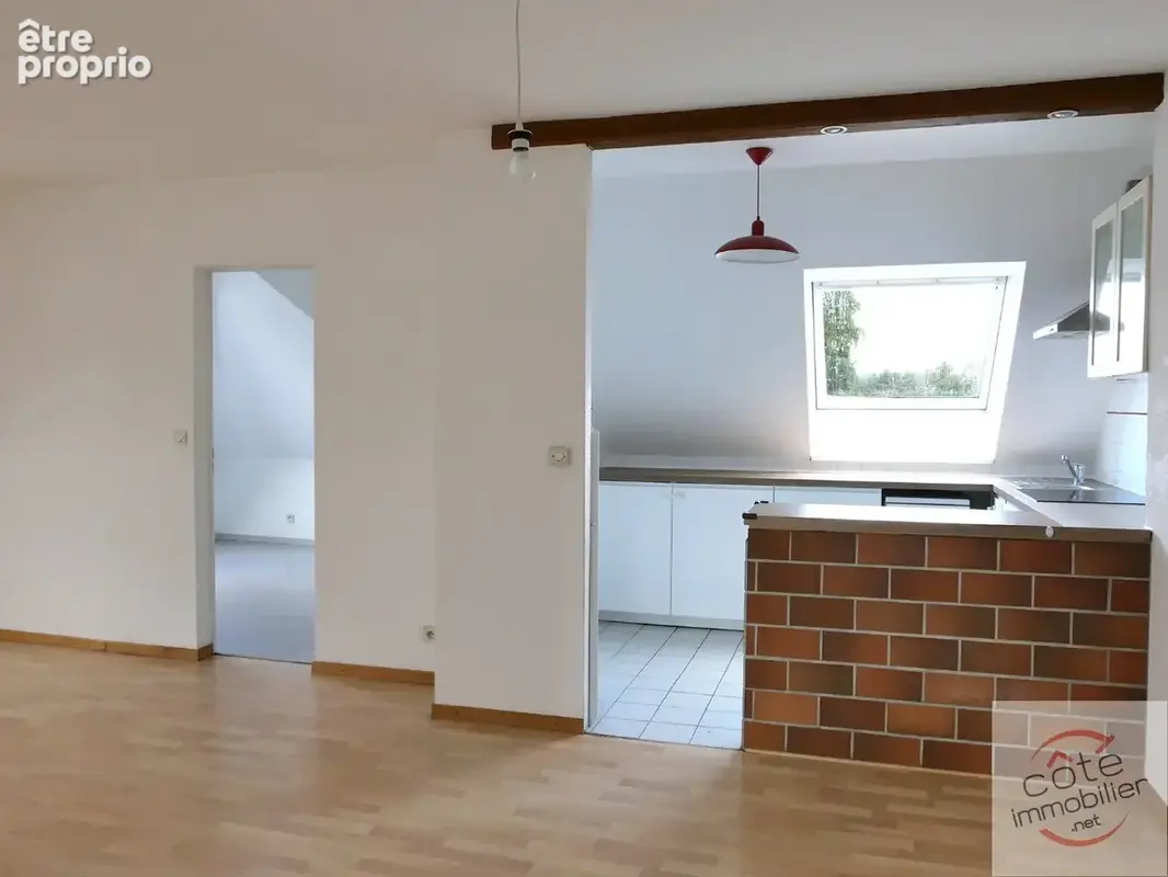 Appartement sous combles dans maison individuelle comprenant trois appartements - photo 6