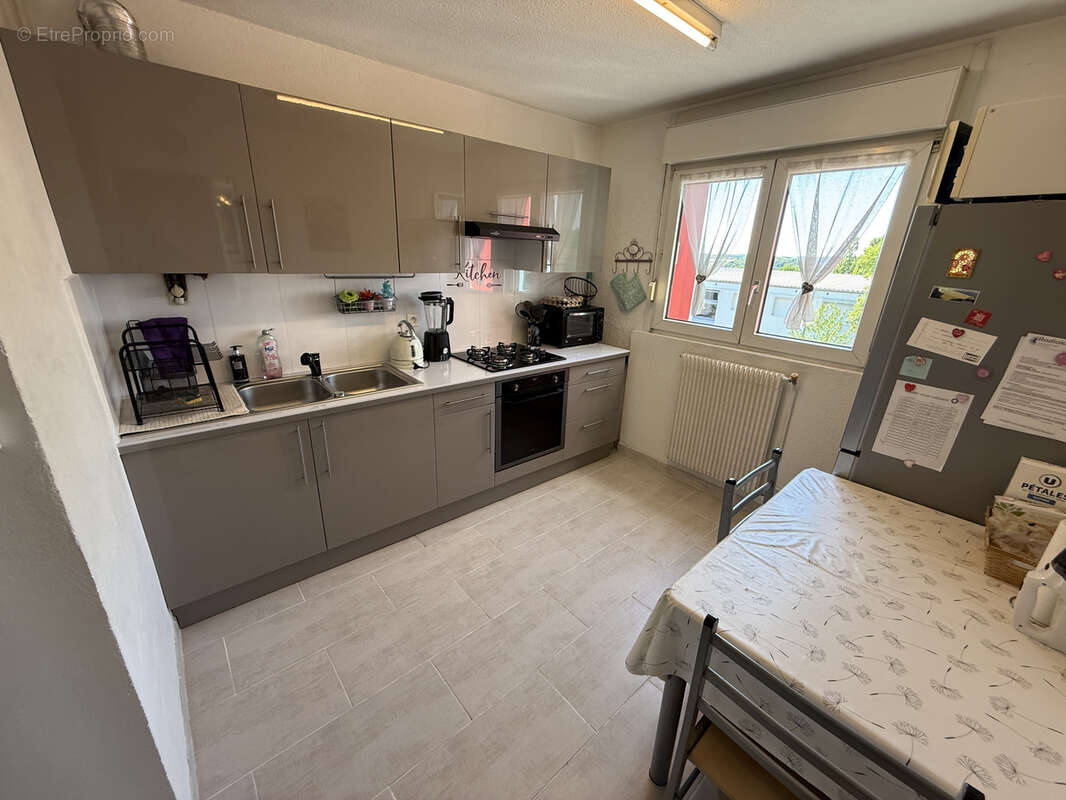 Appartement 5 pièces de 82,20 m2 avec une petite véranda, un balcon et un garage - photo 6