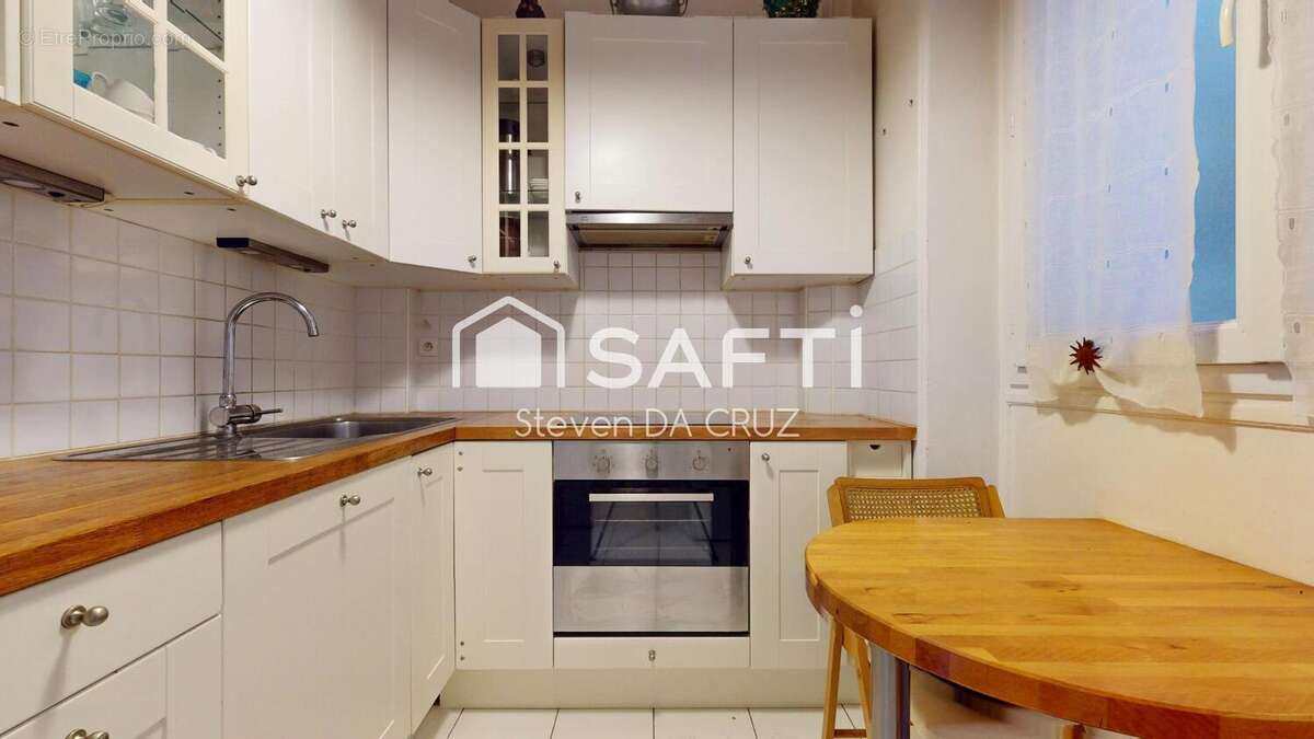 Photo 6 - Appartement à COURBEVOIE