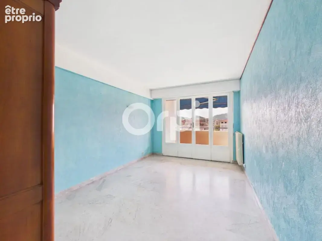 Appartement t3 - 86m2 - stationnement/ cave - centre ville - traversant - dernier étage - photo 9