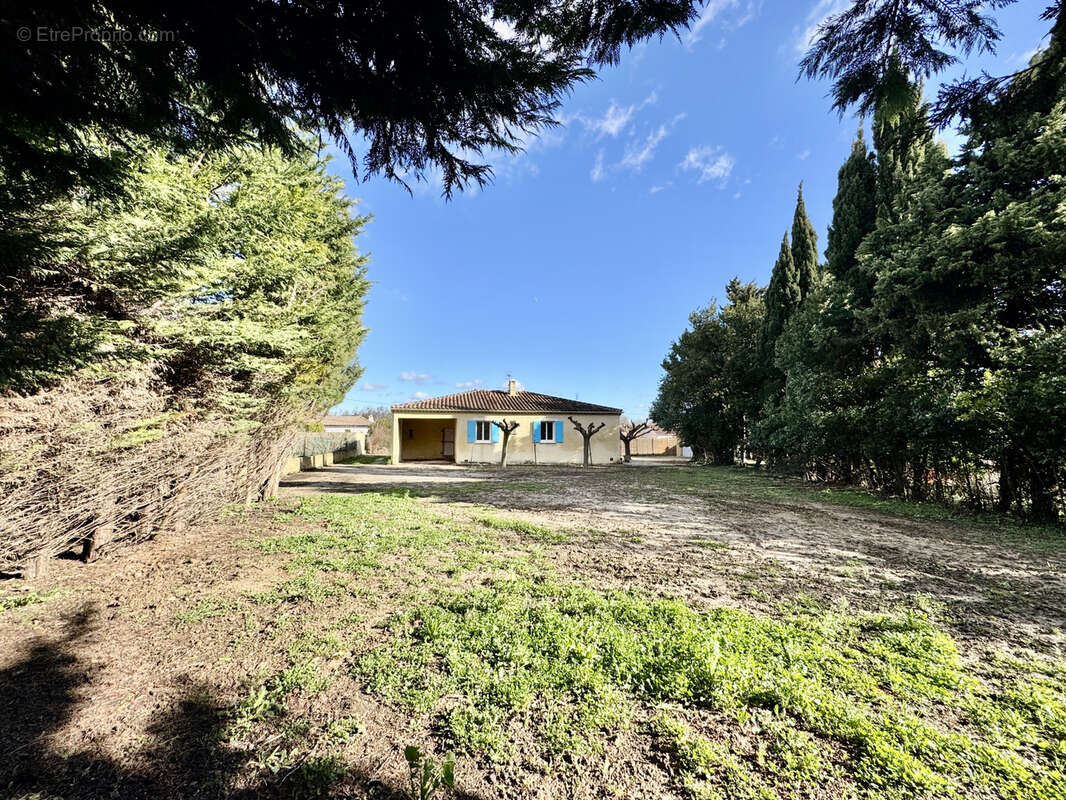 Maison à LAUDUN-L'ARDOISE