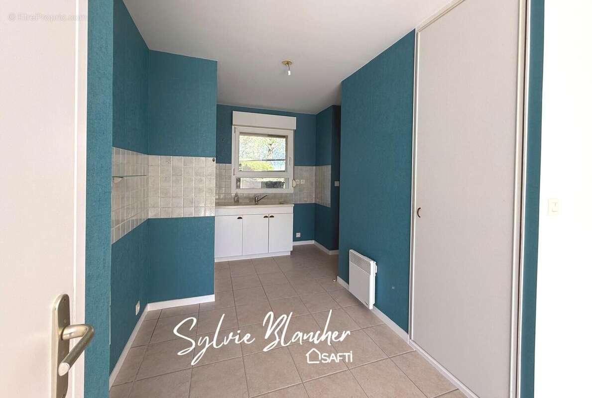 Photo 2 - Appartement à HEROUVILLE-SAINT-CLAIR