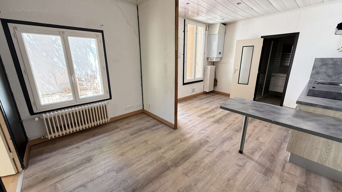 Investissement locatif à Vichy - Immeuble 3 appartements 4 garages - photo 9