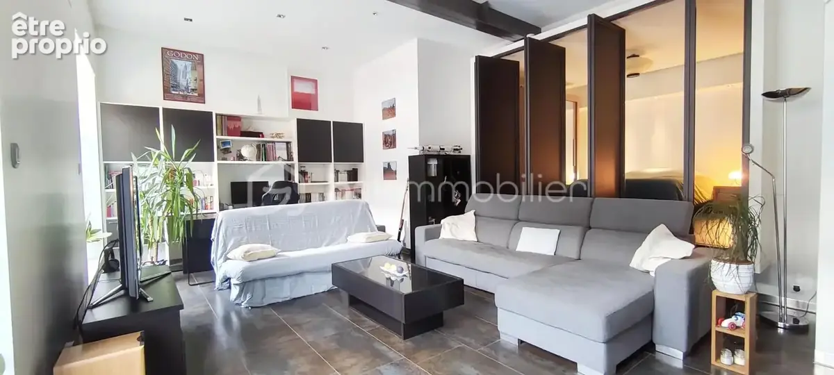 Très bel appartement type loft industriel en arrière corps de bâtiment avec parking et caves - photo 4