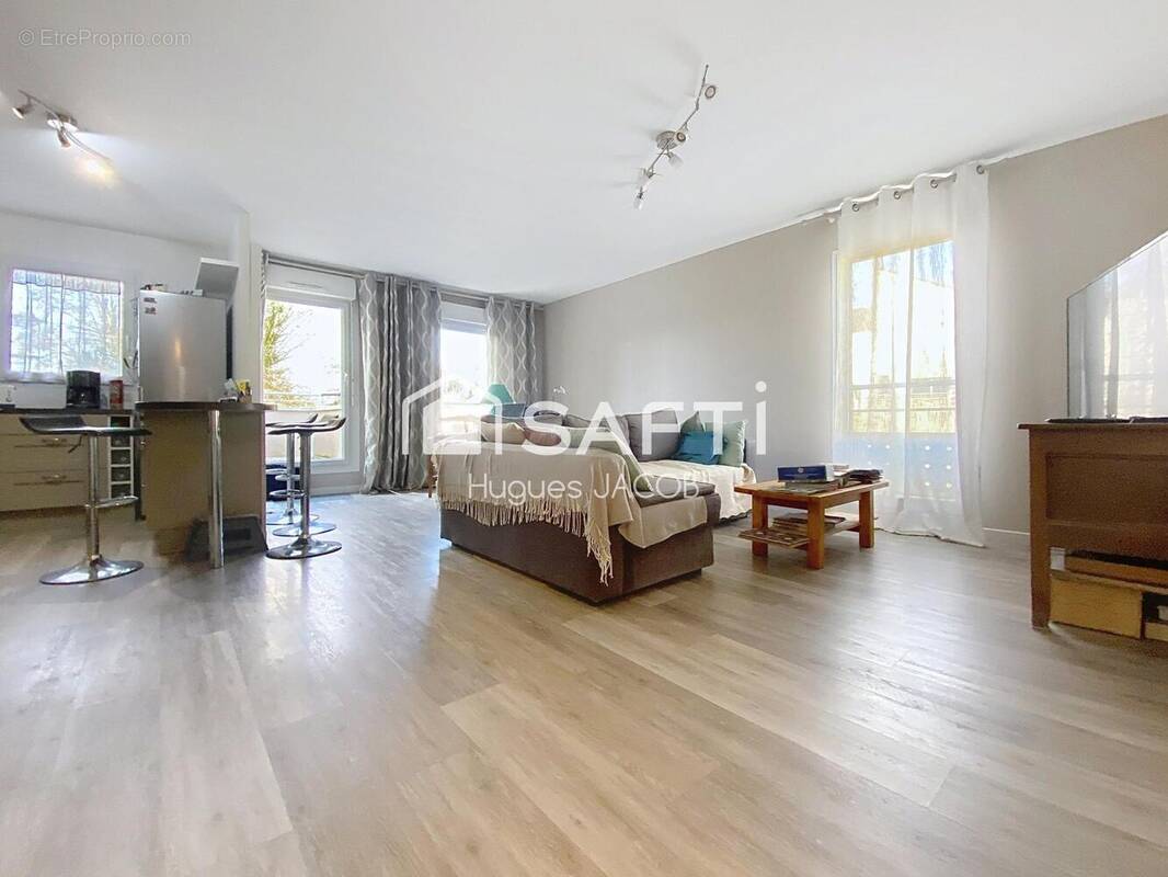 Photo 1 - Appartement à HEROUVILLE-SAINT-CLAIR