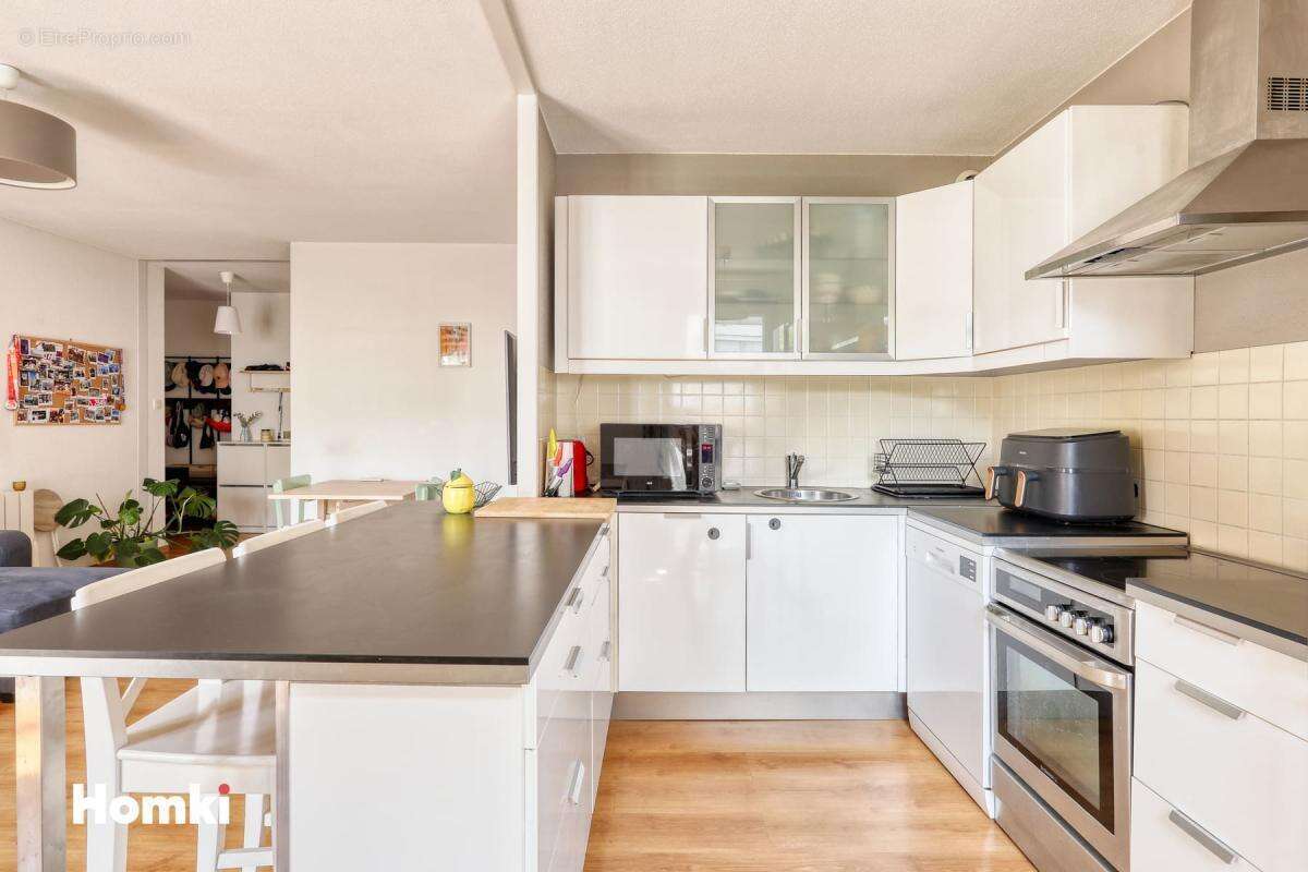 Appartement T3 de 62 m² à Toulouse 31400, Rue Guglielmo Marconi - photo 5
