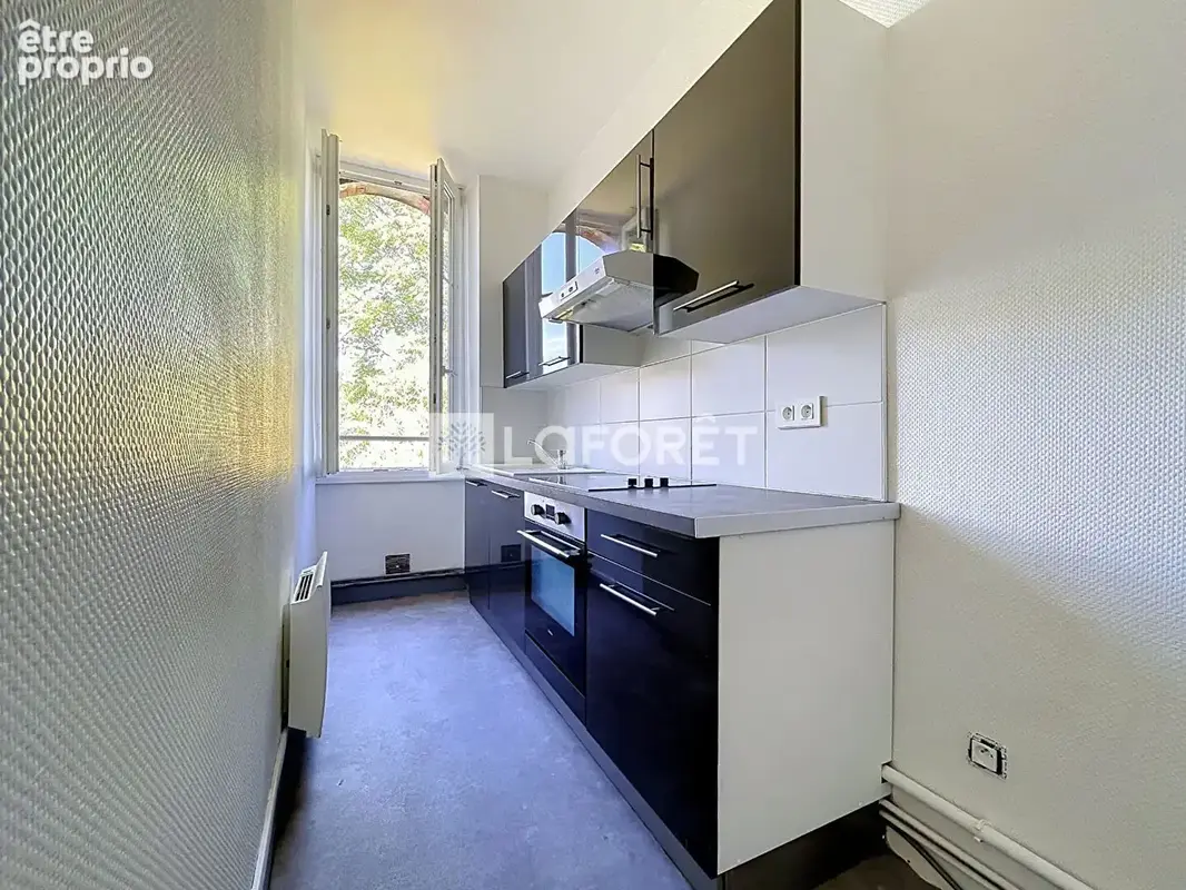 A deux pas de la gare et de la Place de la Visitation T3 de 65m² - photo 7